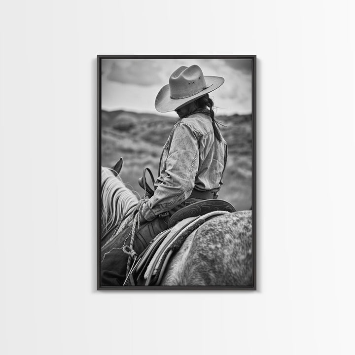 Lone cowboy riding a horse through rugged landscape, classic Western decor black and white photography, Framed Canvas Print, rustic home art