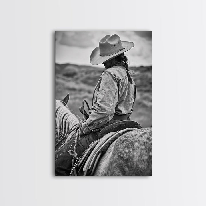 Lone cowboy riding a horse through rugged landscape, classic Western decor black and white photography, Framed Canvas Print, rustic home art