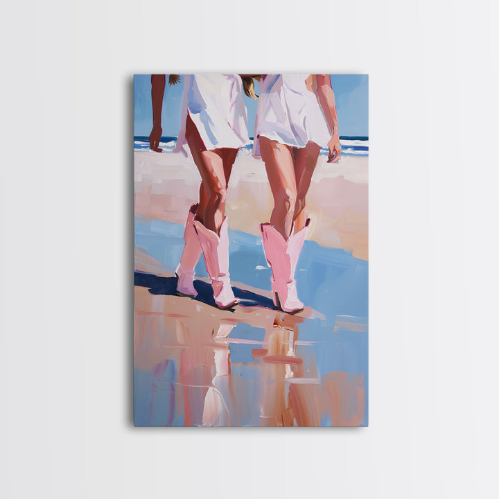 Cowgirls walking on the beach wearing pink cowboy boots, artistic reflection Framed Canvas Print - beach fashion, summer decor, vibrant art