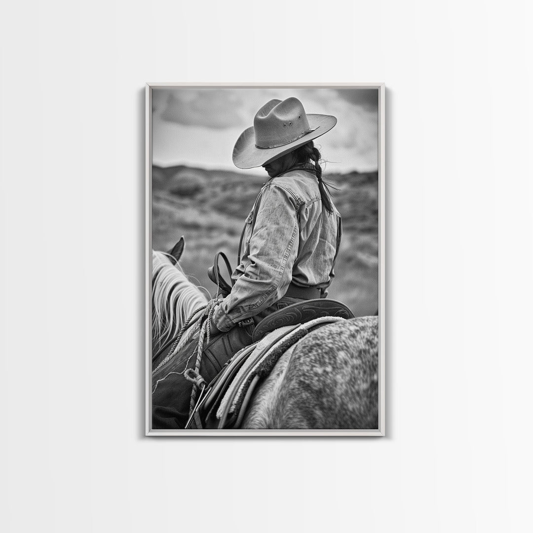 Lone cowboy riding a horse through rugged landscape, classic Western decor black and white photography, Framed Canvas Print, rustic home art