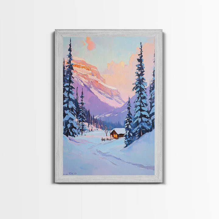 Snowy Cabin at Sunset Framed Canvas Print, Cozy Mountain Retreat with Snow-Covered Pines, Winter Landscape Art for Decor and Rustic Wall Art