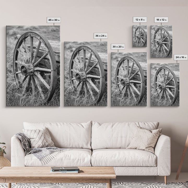 Weathered wagon wheel in tall grass, black and white photography, Framed Canvas Print, rustic Western decor, vintage wall art for home