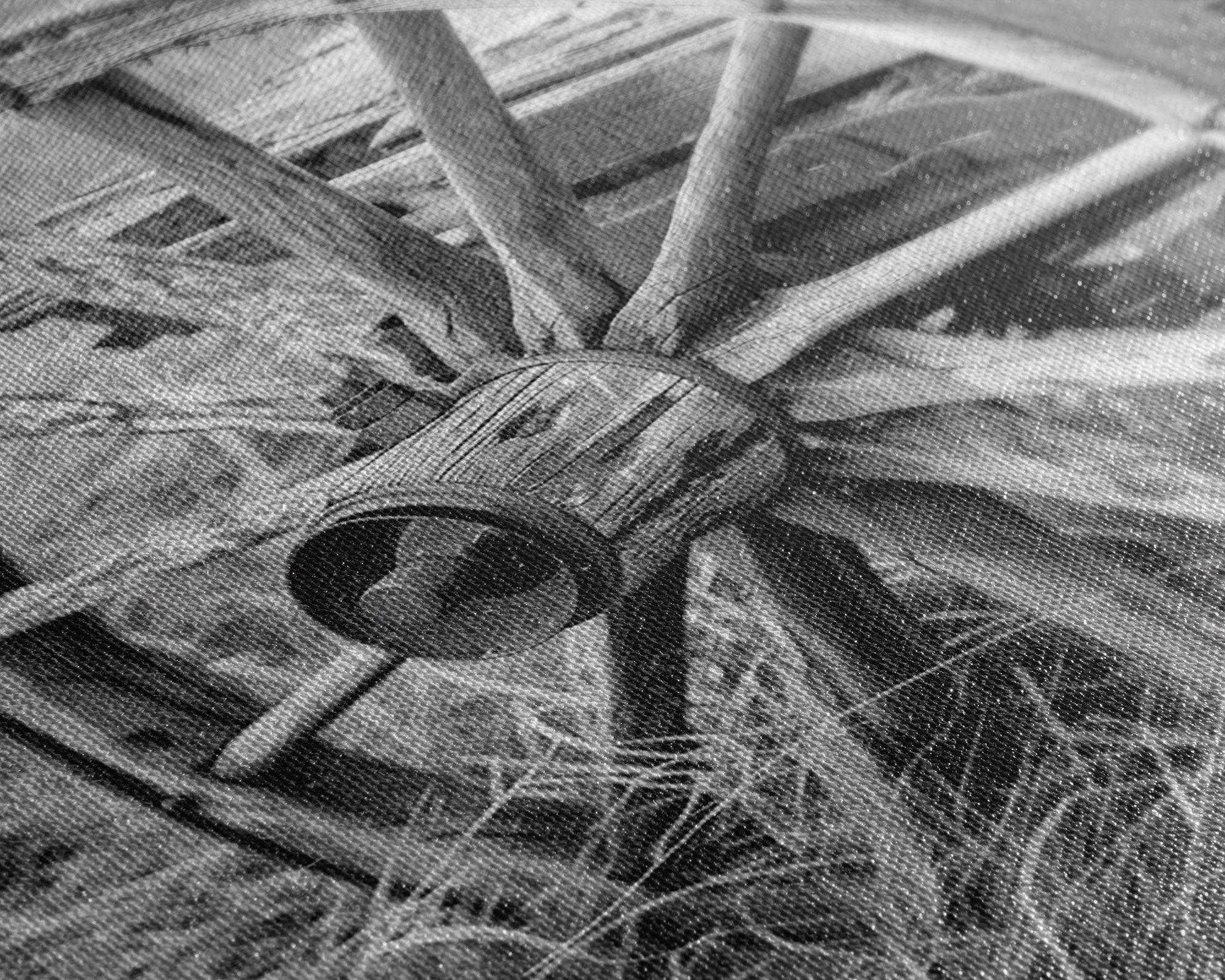 Weathered wagon wheel in tall grass, black and white photography, Framed Canvas Print, rustic Western decor, vintage wall art for home