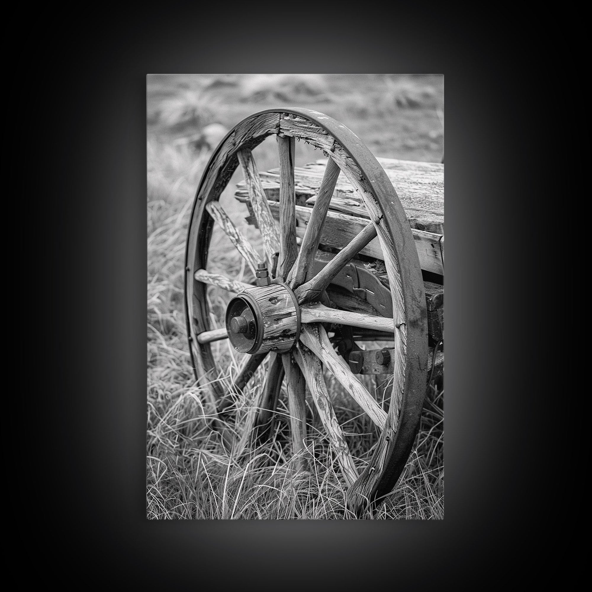 Weathered wagon wheel in tall grass, black and white photography, Framed Canvas Print, rustic Western decor, vintage wall art for home